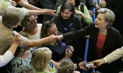 
Hillary Rodham Clinton shakes hands with supporters at a campaign event Monday in Yankton, S.D. Associated Press
 (Associated Press / The Spokesman-Review)