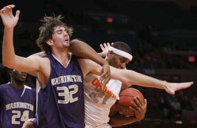
UW's Joe Wolfinger gets tangled up with Syracuse Arinze Onaku. Associated Press
 (Associated Press / The Spokesman-Review)
