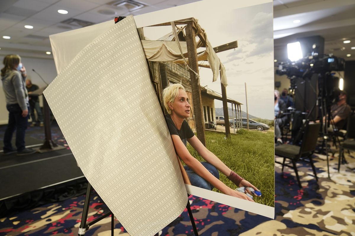 A photo of cinematographer Helyna Hutchins is displayed before a news conference by attorney Gary Dordick and his client Serge Svetnoy, chief of lighting on the "Rust' film set, to announce a lawsuit against Alec Baldwin and others in Beverly Hills, Calif., on Nov. 10, 2021. A judge on Friday, Dec. 10, has decided that the assistant director who handed Alec Baldwin a prop gun that killed cinematographer Hutchins on a New Mexico film set must make himself available for an interview with state workplace safety regulators. Local news outlets reported that a district judge on Friday granted the state officials' request to issue a subpoena to Dave Halls, assistant director for the movie "Rust."  (Damian Dovarganes)