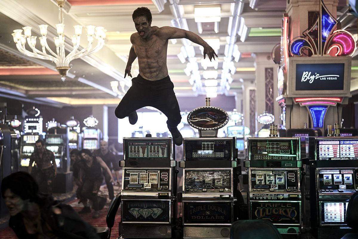 In “Army of the Dead,” a Las Vegas casino vault containing $200 million in cash beckons -- from behind a horde of zombies.   (Clay Enos/Netflix)