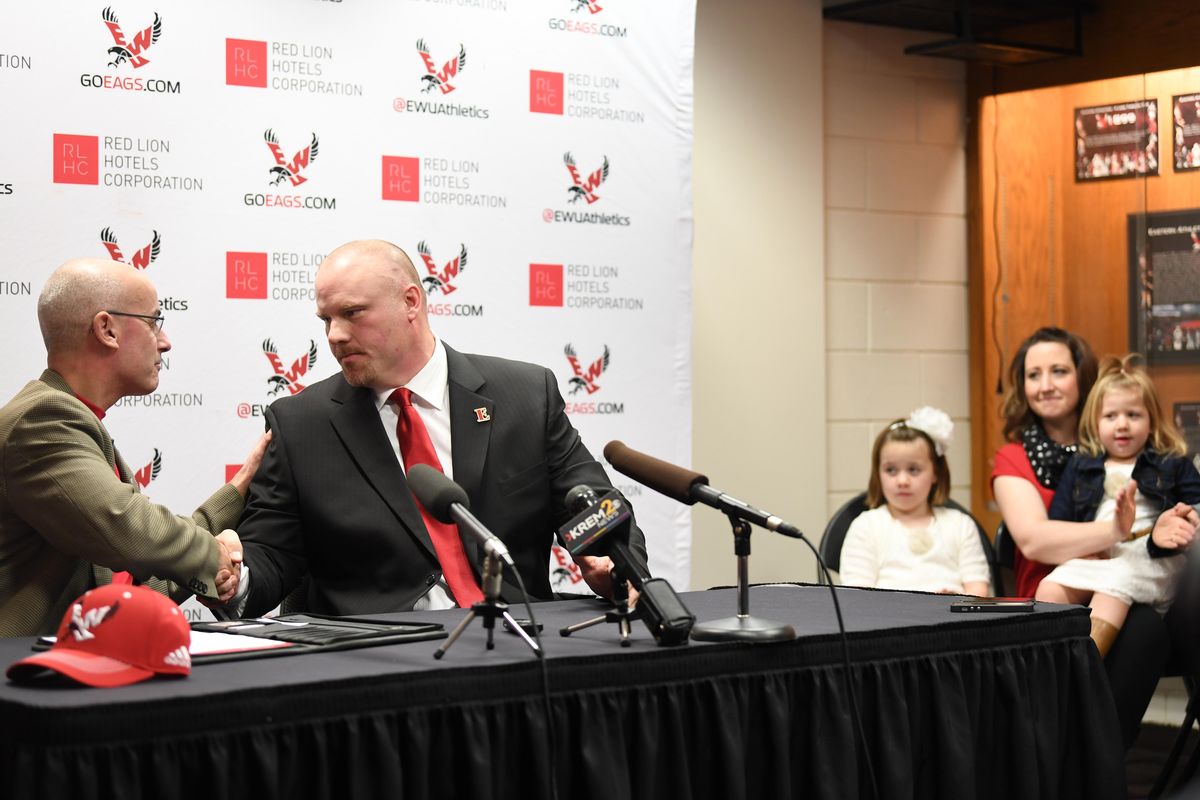 EWU Athletic Director Bill Chaves, left, introduces new football coach Aaron Best last year. (Jesse Tinsley / The Spokesman-Review)