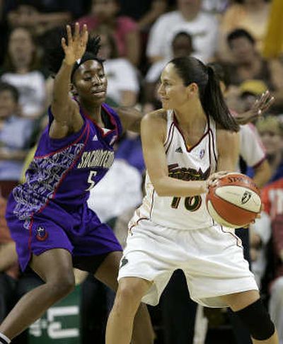 
Seattle's Sue Bird, right, looks to get something going against Sacramento. Associated Press
 (Associated Press / The Spokesman-Review)