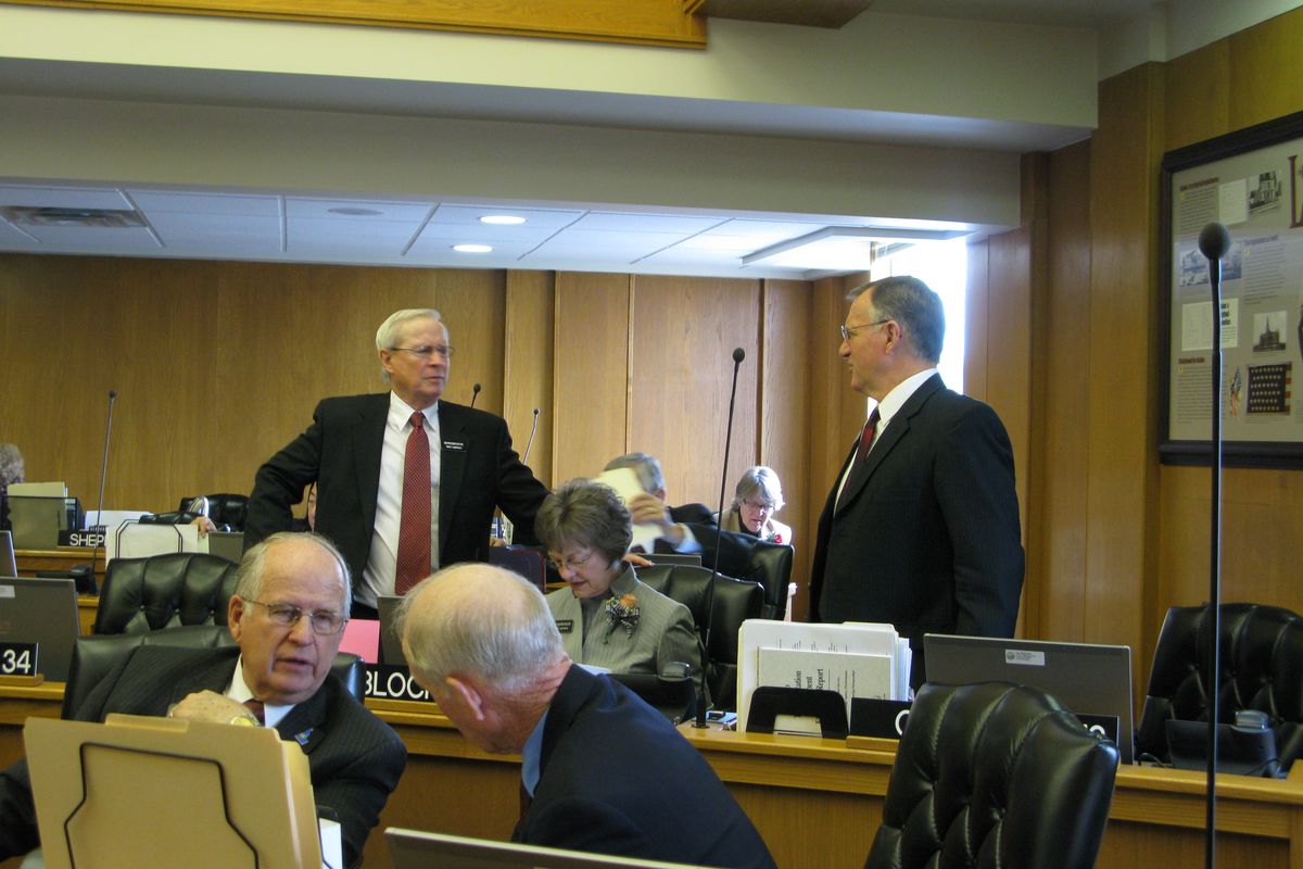 Idaho House members talk after they convened their annual session, 1/12/09. (Betsy Russell / The Spokesman-Review)