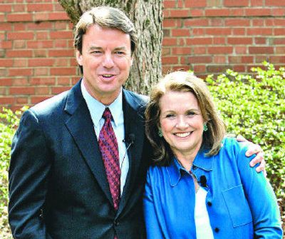 
Democratic presidential hopeful John Edwards puts his arm around his wife, Elizabeth, while they speak about Elizabeth's recurrence of cancer during a news conference Thursday in Chapel Hill, N.C.
 (The Spokesman-Review)