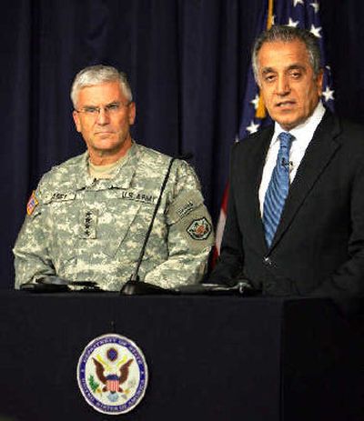 
Top U.S. commander in Iraq, General George Casey, left, and U.S. Ambassador to Iraq Zalmay Khalilzad answer questions Tuesday in Baghdad. 
 (Associated Press / The Spokesman-Review)