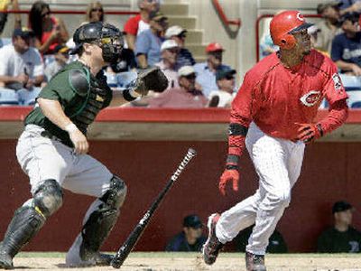 
Ken Griffey Jr., right, is on the disabled list for the eighth time in the past six years.
 (Associated Press / The Spokesman-Review)