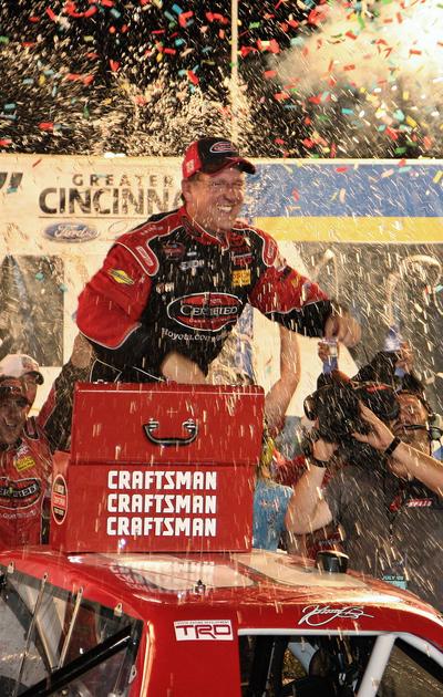 Johnny Benson enjoys his victory in the NASCAR Craftsman Truck Series Built Ford Tough 225.  (Associated Press / The Spokesman-Review)