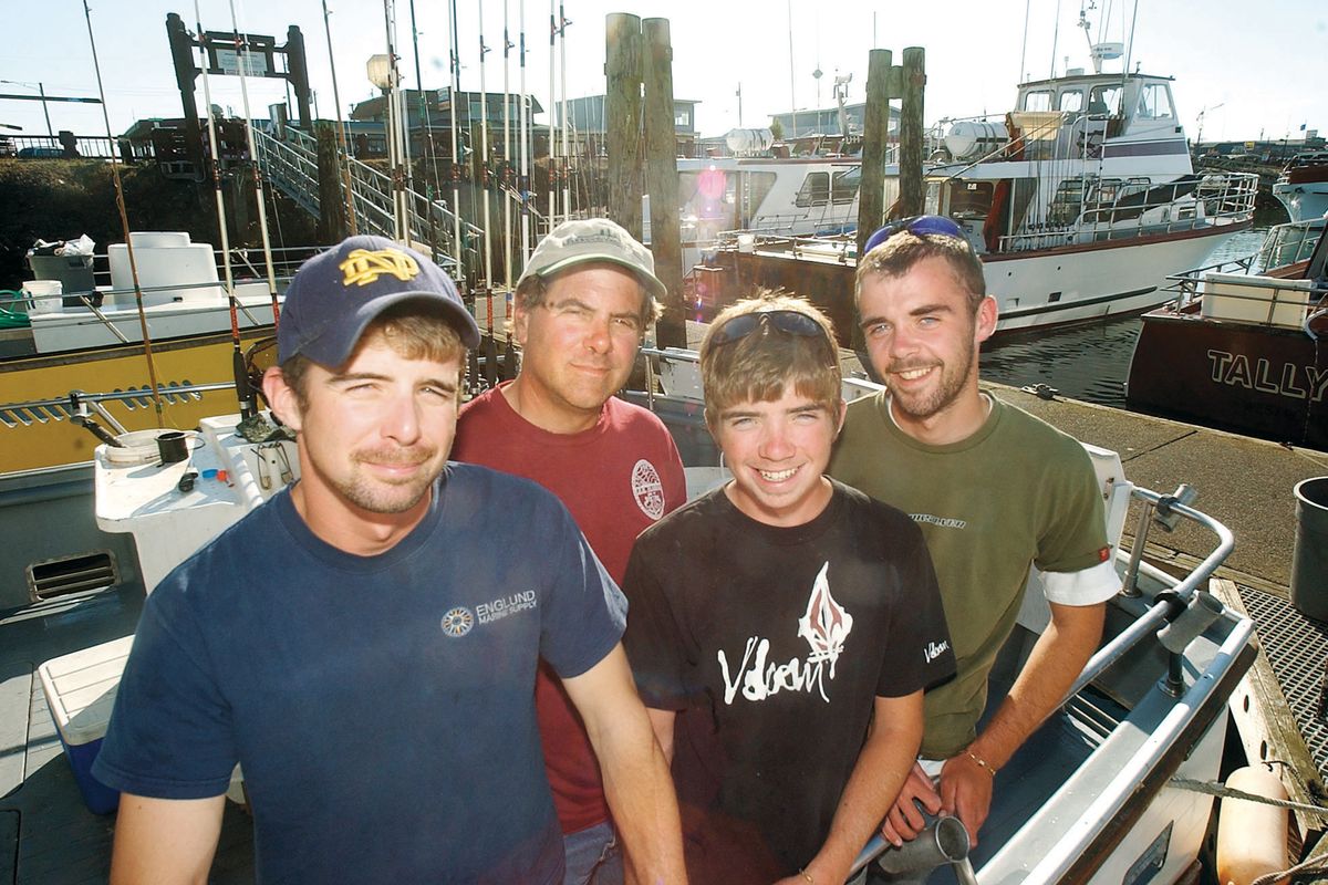 Paul Mirante, second from left, poses with his sons. Robert Mirante, far right, captains his family’s charter fishing boat. (Associated Press)