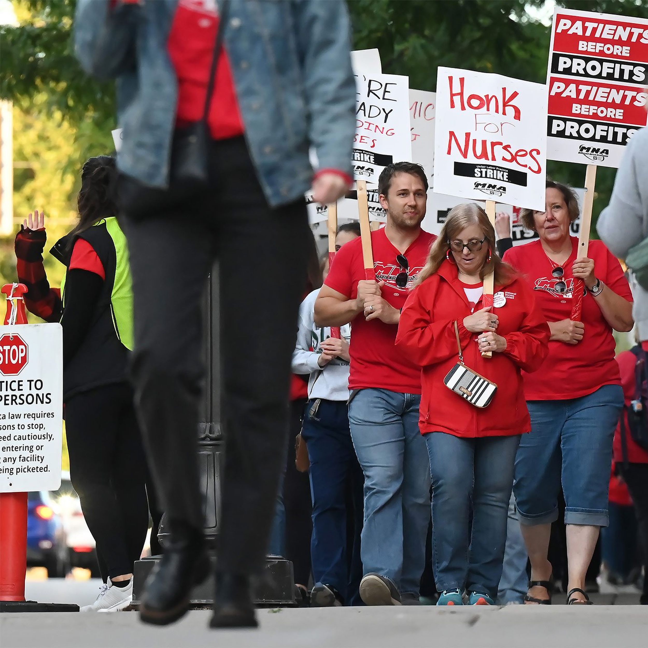 Overworked': US nurses strike over low pay, staffing shortages