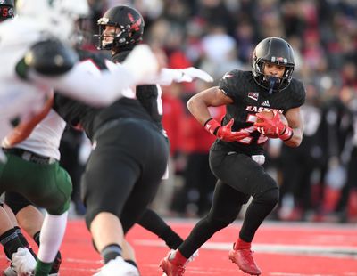 Eastern Washington Eagles running back Antoine Custer Jr.  runs the ball against Portland State during the first half  Nov. 18, 2017, at Roos Field in Cheney. (Tyler Tjomsland / The Spokesman-Review)