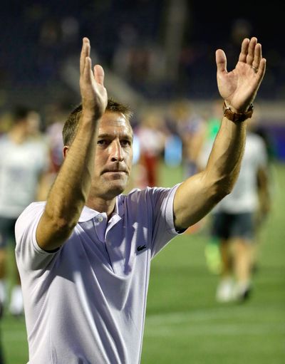 Under different circumstances, new Orlando City coach Jason Kreis might have held a similar spot with the Seattle Sounders. (John Raoux / Associated Press)