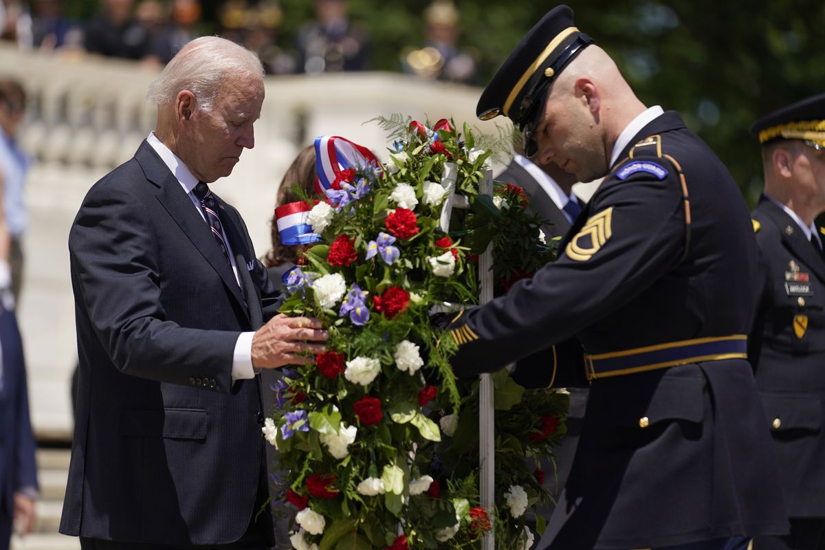 President Joe Biden lays a wreath at The Tomb of the Unknown Soldier at Arlington National Cemetery on Memorial Day, Monday, May 30, 2022, in Arlington, Va.  (Andrew Harnik)