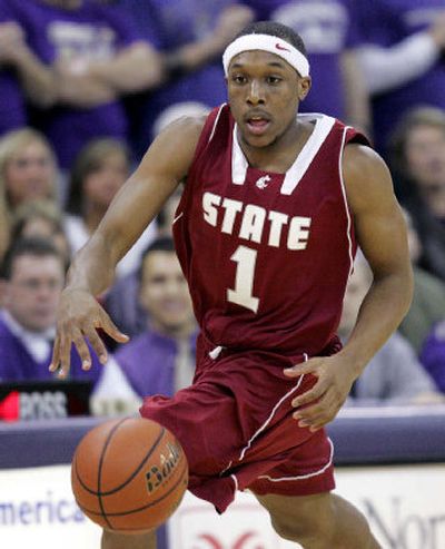 
Sophomore Josh Akognon scores a career-high 27 points for Washington State in the Cougars' 78-71 upset of 10th-ranked Washington. 
 (Associated Press / The Spokesman-Review)