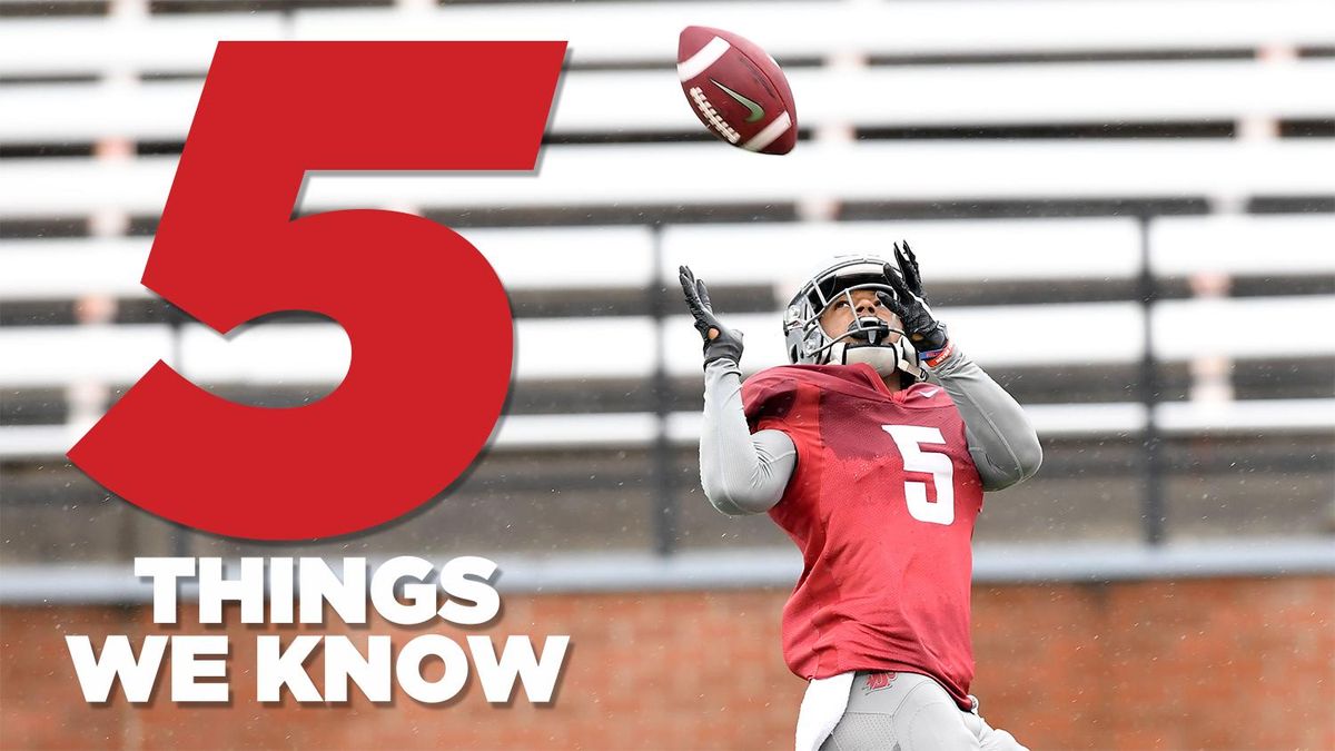Washington State Cougars wide receiver Travell Harris (5) hauls in a long pass during a spring practice on Thursday, April 5, 2018, at Martin Stadium in Pullman, Wash. (Tyler Tjomsland / The Spokesman-Review)