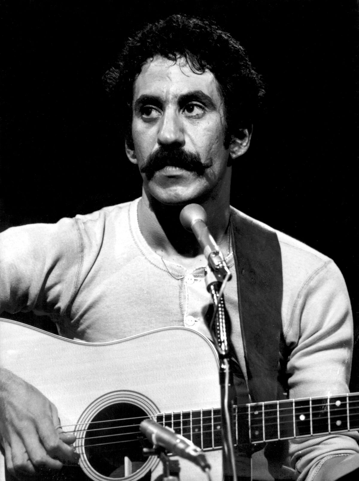 Jim Croce onstage during an appearance on Kenny Rogers