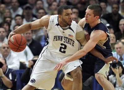Penn State’s Jamelle Cornley drives past Notre Dame’s Zach Hillesland for two of his 15 points. (Associated Press / The Spokesman-Review)