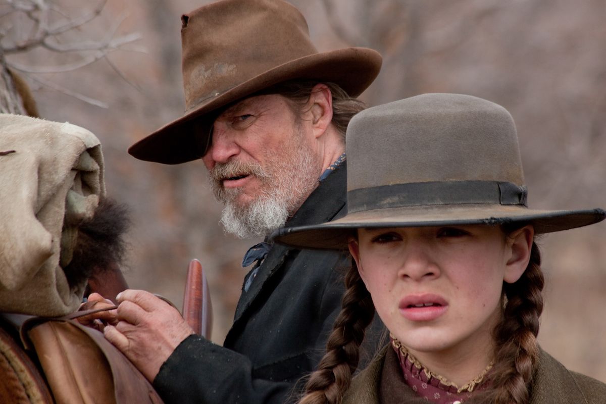 Jeff Bridges, as Rooster Cogburn, and Hailee Steinfeld as Mattie Ross star in the Coen brothers’ remake “True Grit.”  (Associated Press)