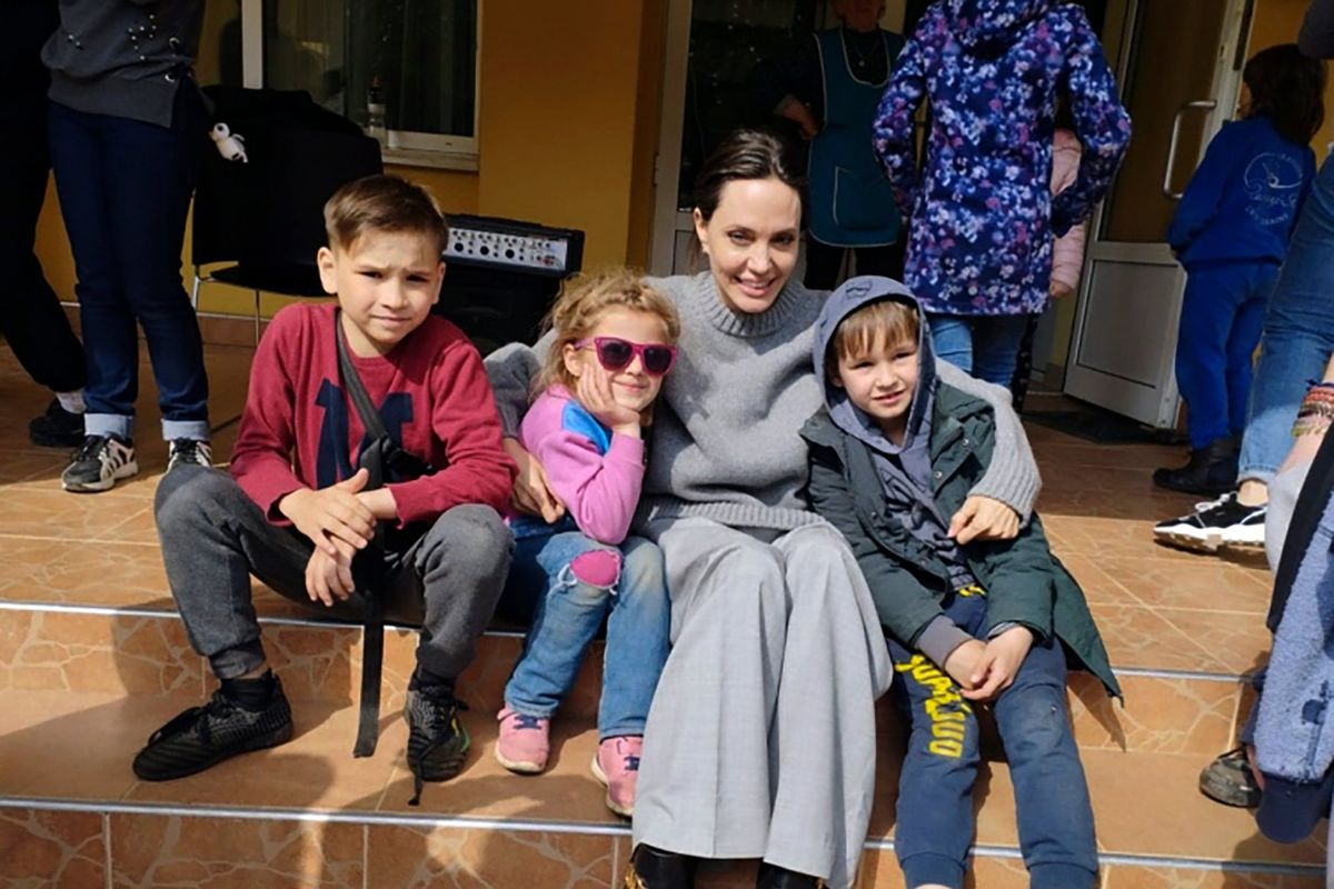 Angelina Jolie, Hollywood actor and UNHCR goodwill ambassador, poses for a photo with kids in Lviv, Ukraine, on Saturday.  (Maksym Kozutsky)
