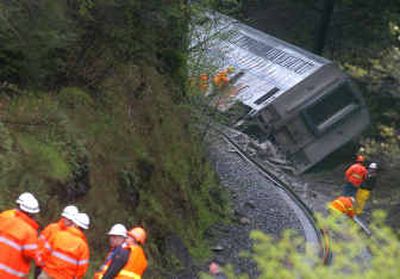 
An Amtrak train is shown after it derailed Sunday near White Salmon, Wash. The Portland-bound train was carrying 115. 
 (Associated Press / The Spokesman-Review)