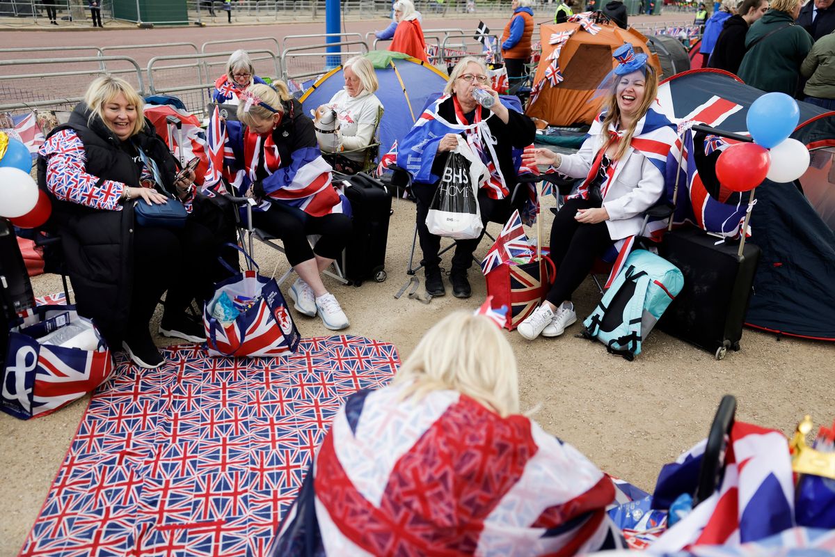 Royal enthusiasts are seen camped on The Mall as preparations continue for The Coronation on May 05, 2023, in London, England. The Coronation of King Charles III and The Queen Consort will take place on May 6, part of a three-day celebration.    (Jeff J Mitchell/Getty Images North America/TNS)