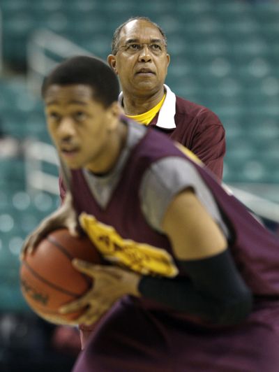 Tubby Smith looks on as Devron Bostick practices for today’s game. (Associated Press / The Spokesman-Review)
