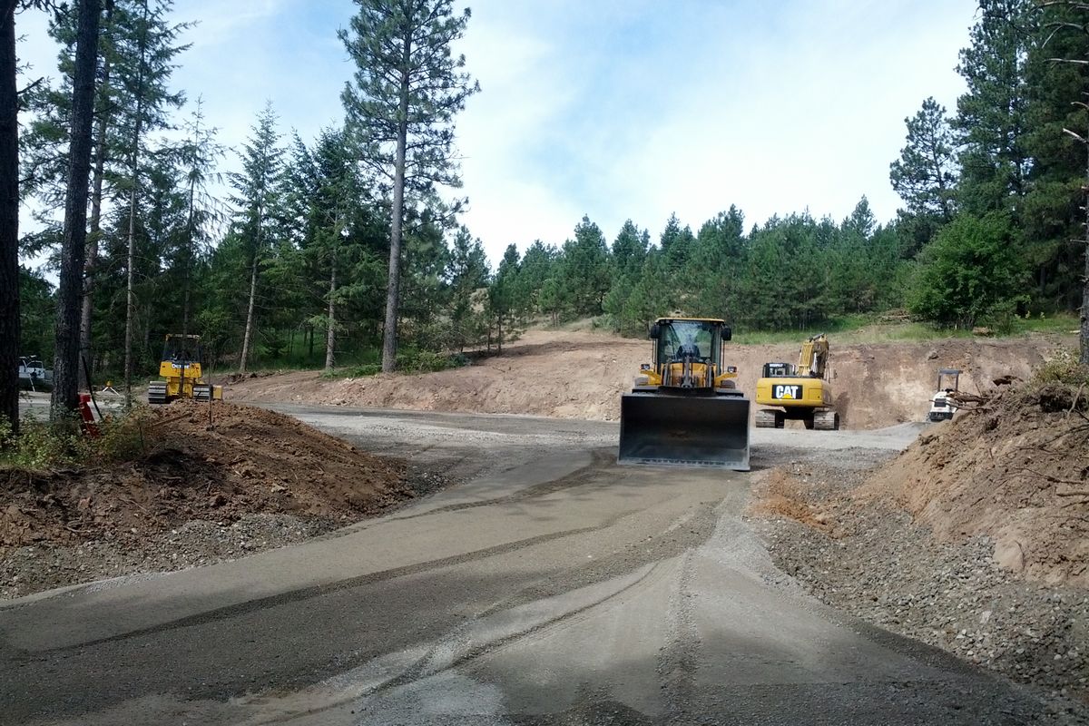 Heavy equipment working on parking area for Big Rock Conservation Area off Stevens Creek Road (Tanner Grant)