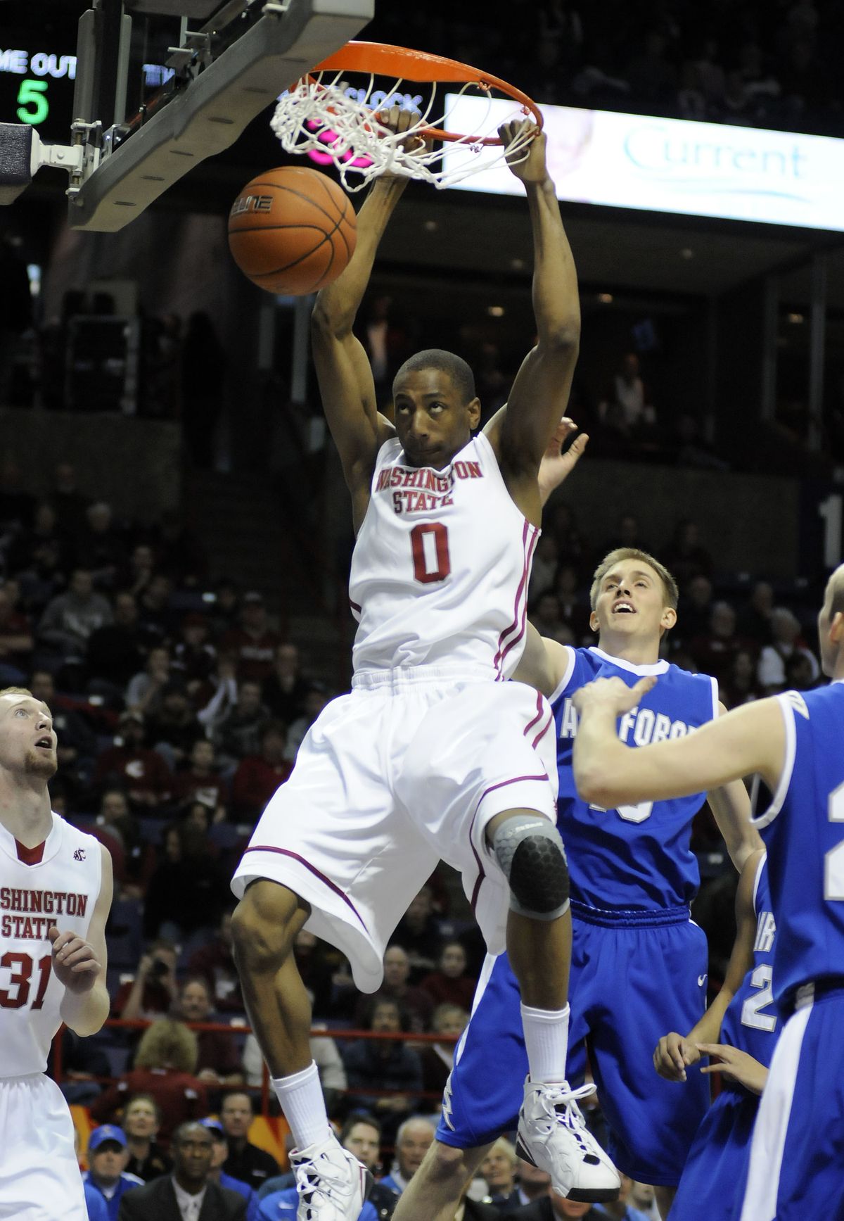 Washington State’s Marcus Capers executes a first-half slam Saturday at the Arena. (Dan Pelle)