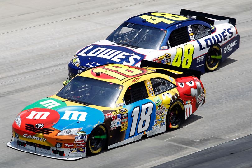 Kyle Busch and Jimmie Johnson battle on track - swapping the lead consistently. Johnson led eight times and Busch led six times. (Photo courtesy of Todd Warshaw/Getty Images) (Todd Warshaw / Getty Images North America)