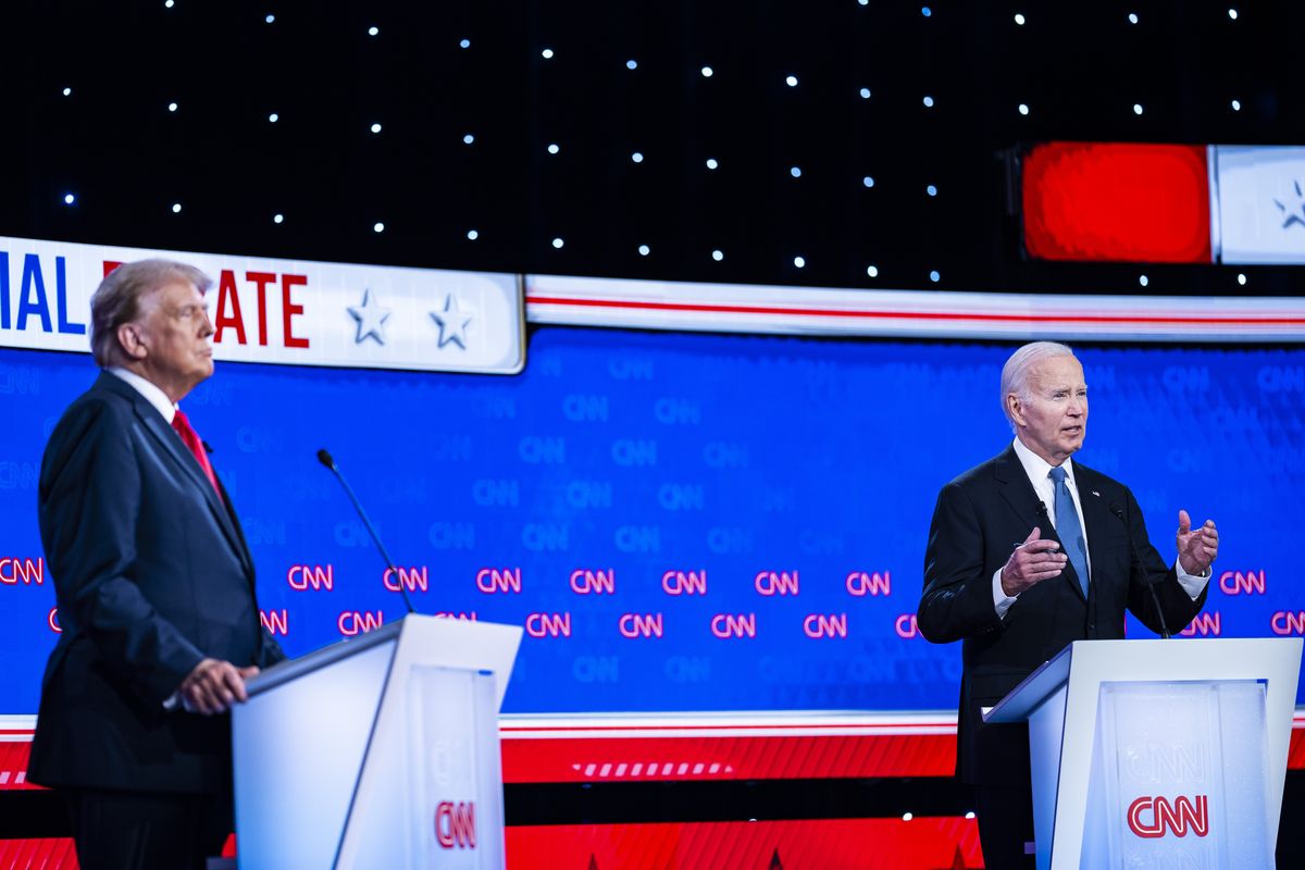 Donald Trump and President Joe Biden debate in Atlanta on June 27.   (Jabin Botsford/The Washington Post)