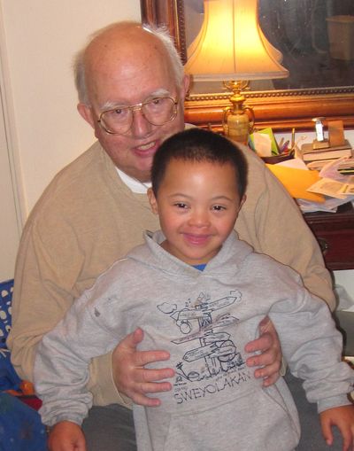 Harv Clark, pictured on Christmas Eve, 2010, with his grandson Kenner, died Friday after a long battle with heart disease. He was 69. Clark was a fixture on Spokane radio since the 1960s. (Courtesty of Erin Clark)