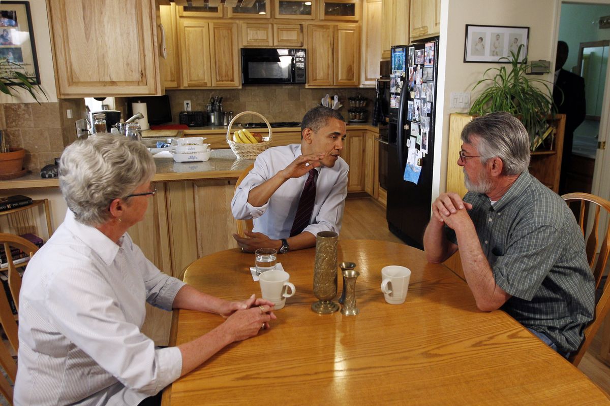 President Barack Obama meets with Val and Paul Keller in their home Friday in Reno, Nev. (Associated Press)