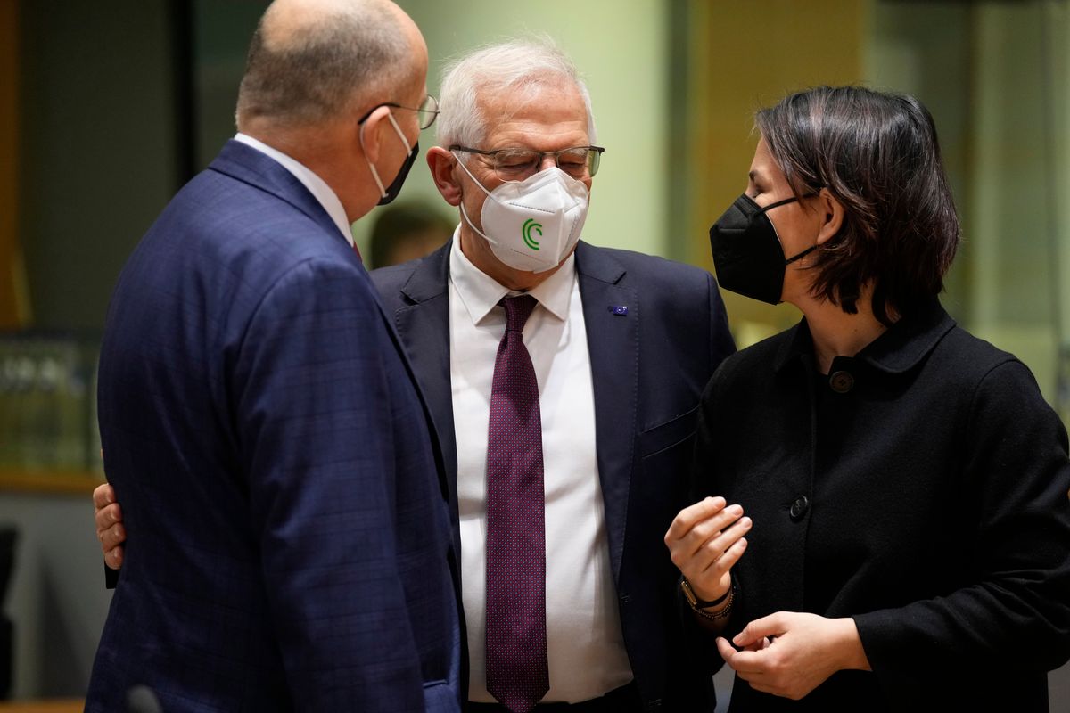 German Foreign Minister Annalena Baerbock, right, speaks with Poland