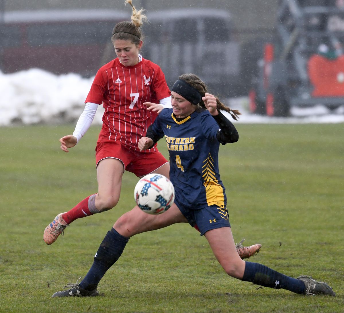 Eastern’s Delaney Romero (7) tangles with Northern Colorados Maddie Barkow (4) at midfield, Sunday, Nov. 5, 2107, at Eastern Washington University. It was the Big Sky title game, which the Eagles won 3-0 over the Bears. (Jesse Tinsley / The Spokesman-Review)