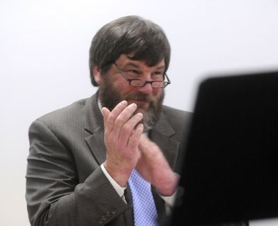 East Valley Superintendent John Glenewinkel applauds members of the Mountain View Middle School Band during a perfomance before the Jan. 25 school board meeting.  (J. Bart Rayniak)