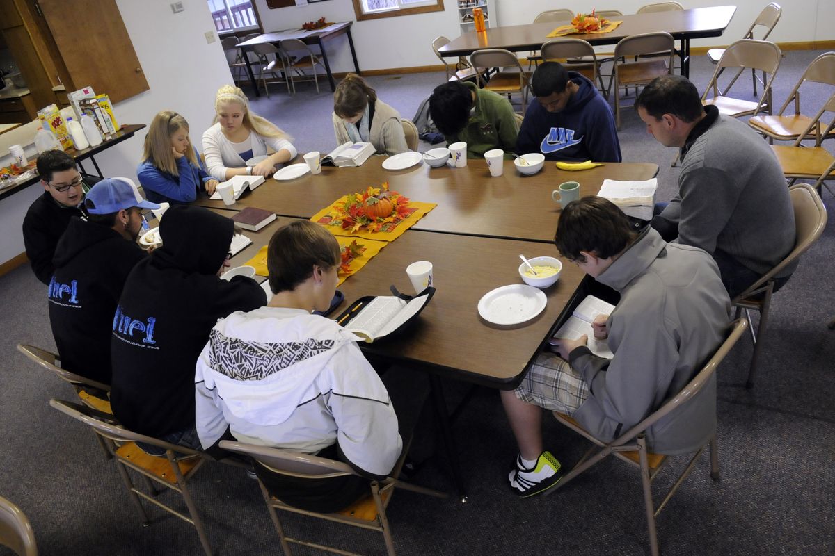 Central Valley High School students share breakfast and Bible study at Good Shepherd Lutheran Church,  Nov. 4. Students have been invited to  the weekly ministry  by Gordon Fitch, top right, who is a youth minister at several Valley Lutheran churches. (J. BART RAYNIAK / The Spokesman-Review)