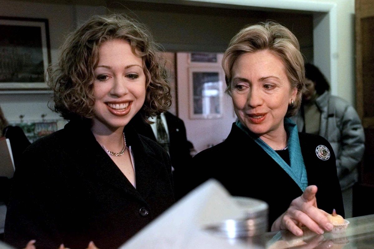 Senate candidate and then-First Lady Hillary Clinton, with daughter Chelsea, look over marzipan pastries at the Florentine Pastry Shop in Utica, N.Y. as they started their third day of a three-day trip in upstate New York in October 2000. (Jim Mcknight / Associated Press)