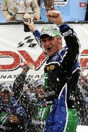 Clint Bowyer celebrates winning the Dover 200 at Dover International Speedway, his second win of the season. (Photo Credit: Jeff Zelevansky/Getty Images)  (Jeff Zelevansky / The Spokesman-Review)