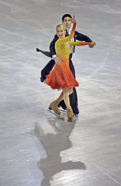 Kimberly Nvarro and Brent Bommentre cast a shadow across the ice on their way to third place in the the compulsory dance. (CHRISTOPHER ANDERSON / The Spokesman-Review)