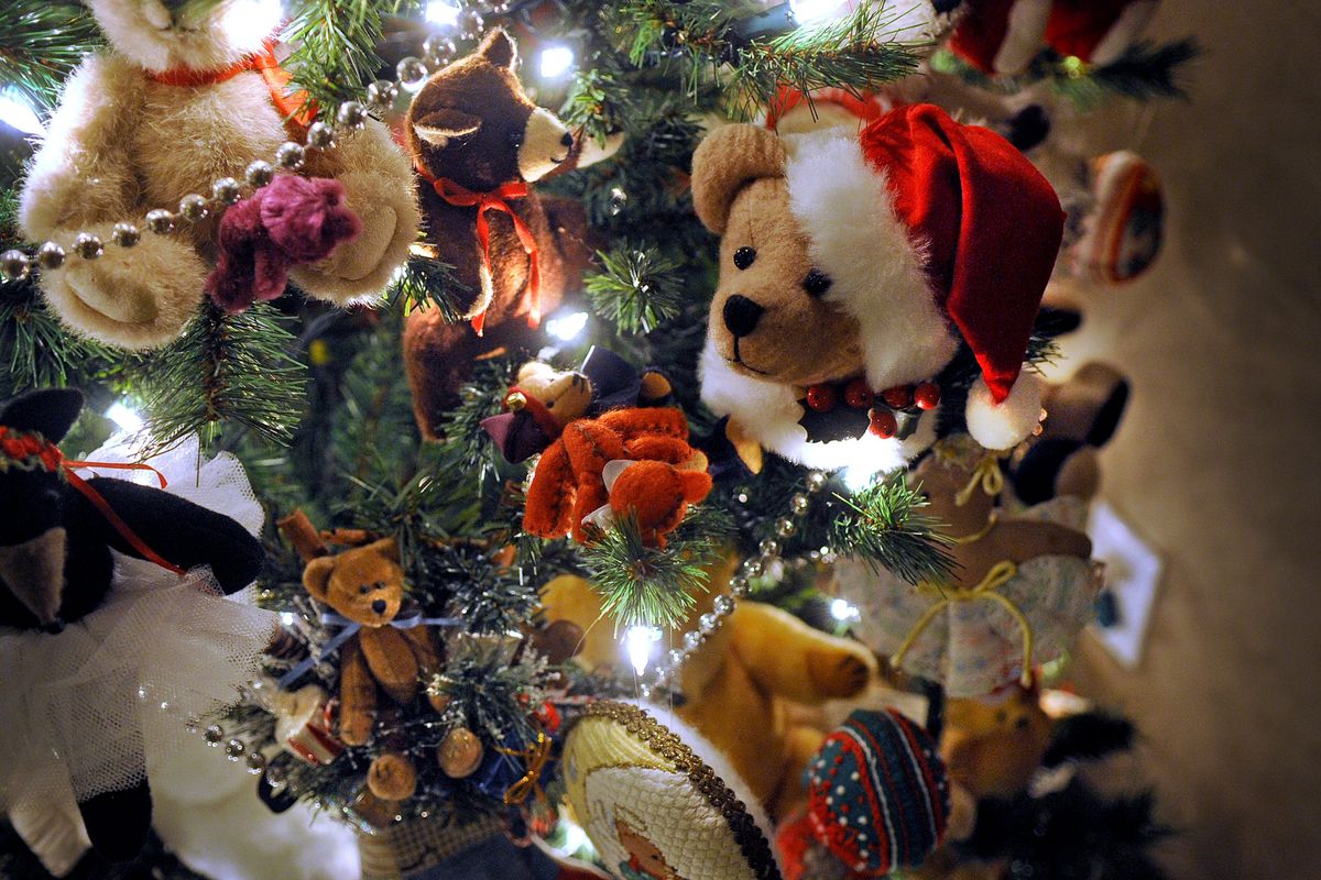 Dozens of bears hang on the Bear Tree made by Elise Bozzo on Dec. 5 in her Spokane Valley living room.  (Christopher Anderson/For The Spokesman-Review)