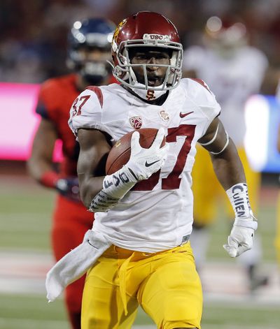 USC running back Javorius Allen runs for his second touchdown. (Associated Press)