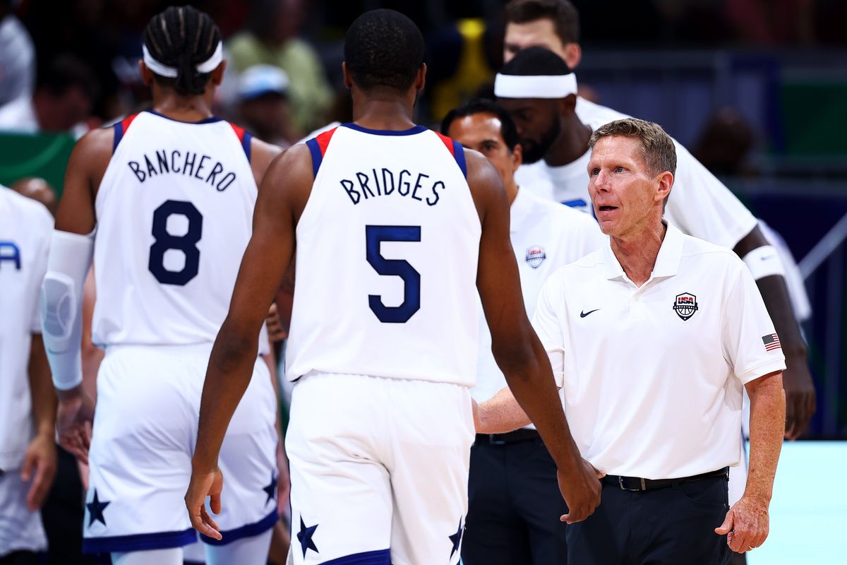 Assistant coach Mark Few of the United States speaks with Mikal Bridges at the end of the third quarter during the FIBA Basketball World Cup 2nd Round Group J game against Montenegro at Mall of Asia Arena on September 1, 2023 in Manila, Philippines.  (Getty Images)