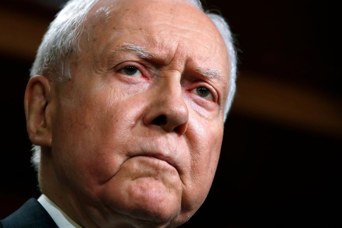 FILE - Sen. Orrin Hatch, R-Utah, attends a news conference with Republican members of the Senate Judiciary Committee on Capitol Hill in Washington on Oct. 4, 2018. A longtime senator known for working across party lines, Hatch died Saturday, April 23, 2022, at age 88.  (Jacquelyn Martin)