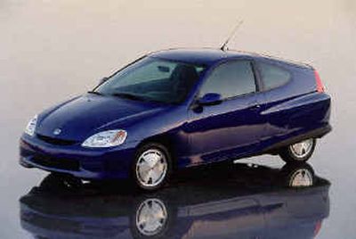 
At 61 miles per gallon in the city and 66 mpg on the highway, the 2005 Honda Insight is the most fuel-efficient car, according to the Environmental Protection Agency.
 (Associated Press / The Spokesman-Review)