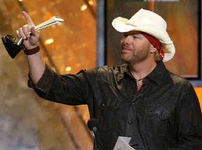 
Toby Keith accepts his award for top male vocalist at the 39th annual Academy of Country Music Awards at the Mandalay Bay Resort & Casino in Las Vegas. Toby Keith accepts his award for top male vocalist at the 39th annual Academy of Country Music Awards at the Mandalay Bay Resort & Casino in Las Vegas. 
 (Associated PressAssociated Press / The Spokesman-Review)