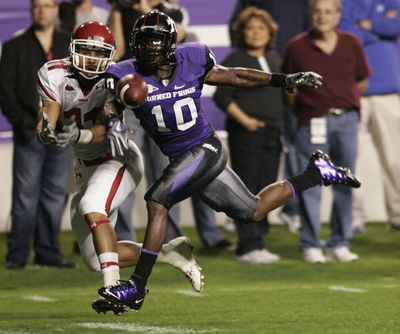 TCU cornerback Rafael Priest, right, breaks up a pass intended for Utah wide receiver Luke Matthews. (Associated Press)