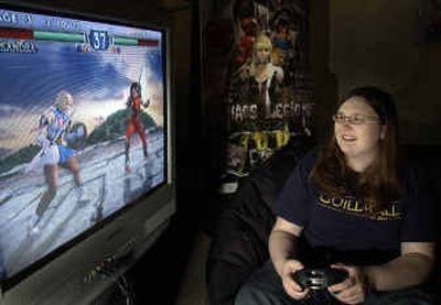 
Jennifer Canada plays a video game in Plano, Texas, Wednesday. Canada, who is studing level design at Southern Methodist University's Guildhall school of video game making,  is one of only two female students in the program.
 (Associated Press / The Spokesman-Review)