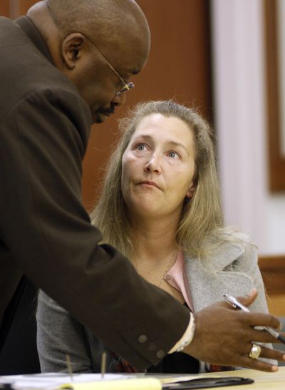 Sherry Johnston talks to her attorney, Rex Butler, in court Wednesday.  (Associated Press / The Spokesman-Review)