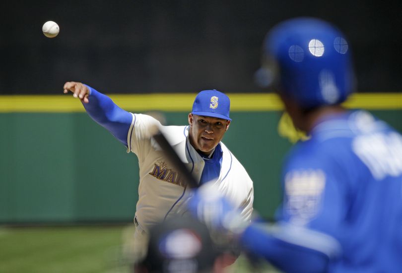 Mariners starting pitcher Taijuan Walker went five innings, giving up three runs, two earned. (Ted S. Warren / Associated Press)