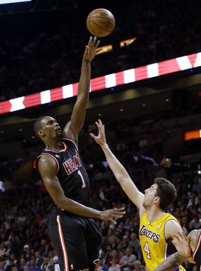 Miami’s Chris Bosh had 31 points, going 15 for 22. (Associated Press)