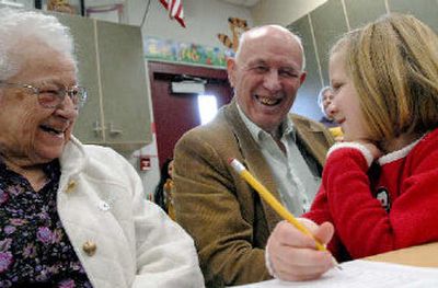 
Ramsey Elemenatry second-grader Samantha Miller shares a laugh with her grandparents, Lois and James Bowers during Grandparents Day at Ramsey Elementary on Monday. 
 (Kathy Plonka / The Spokesman-Review)